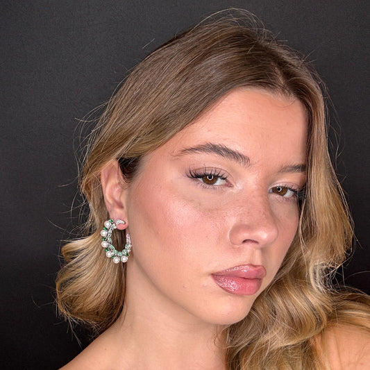 Semicerchi di perline e foglione