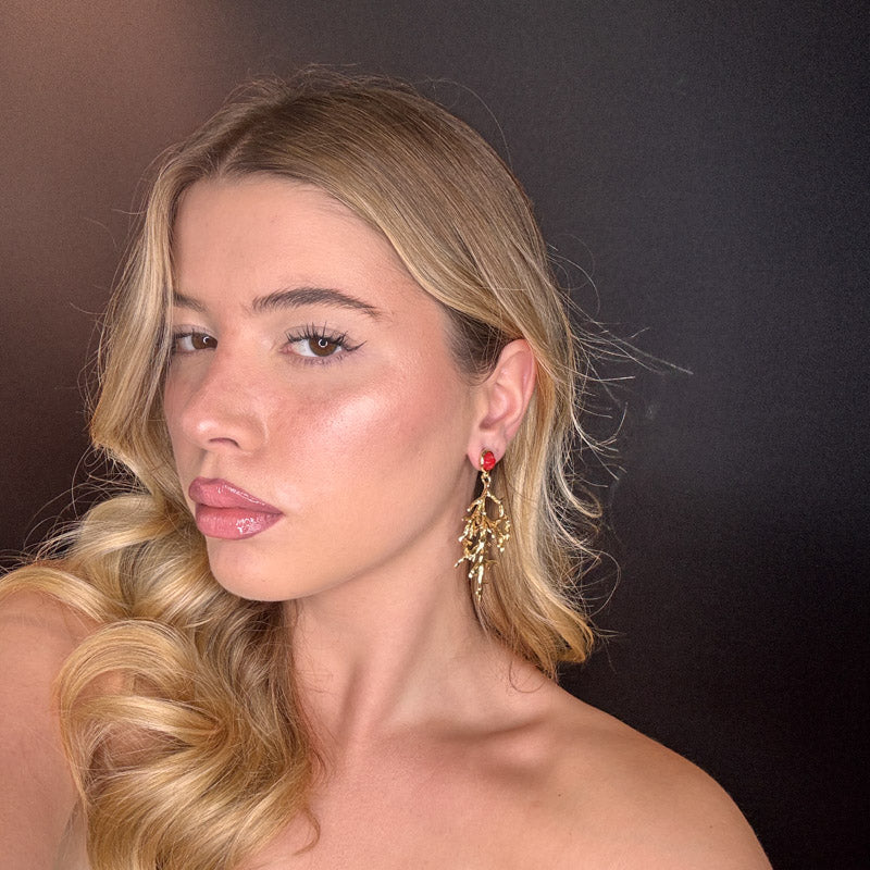 Corallo dorato con bottone irregolare