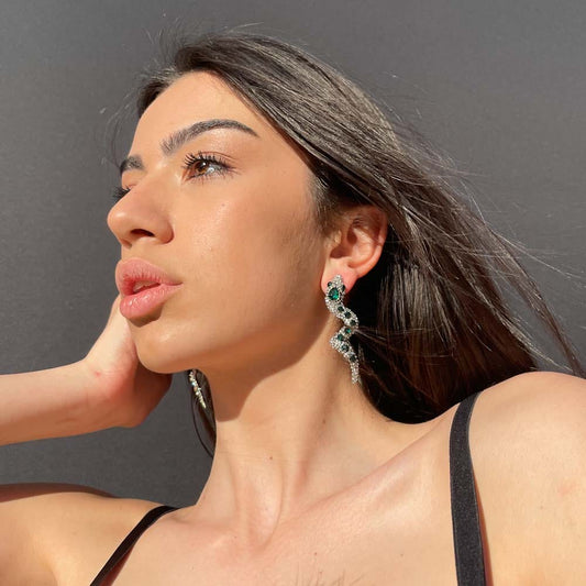 Palestro Milano Orecchini Pitone Reale