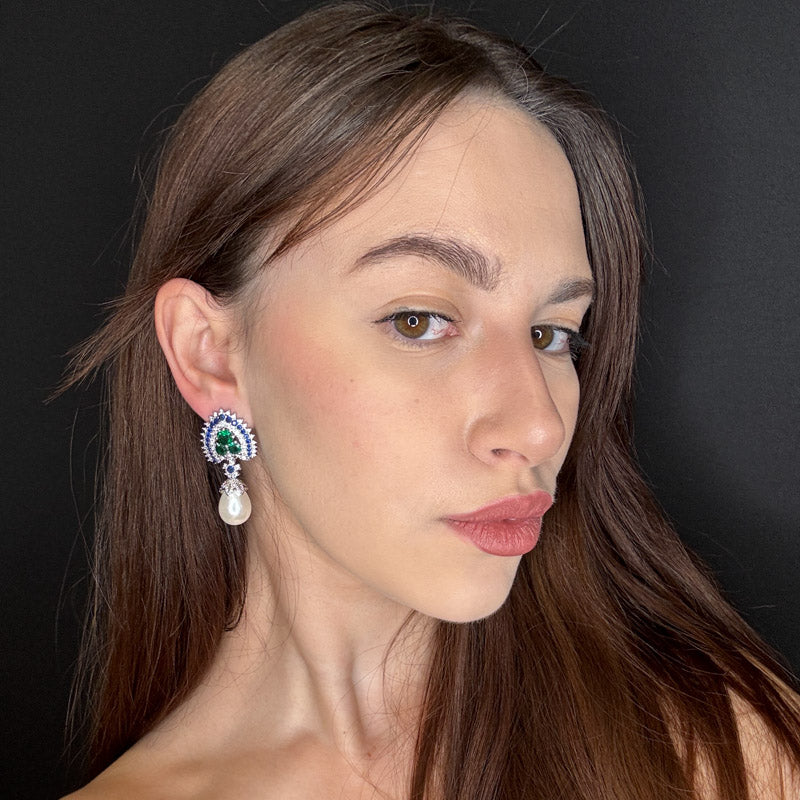 Pavone con perla pendente