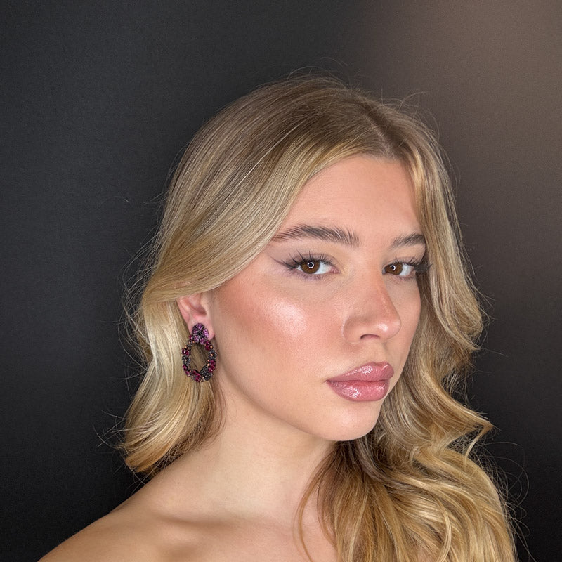 Fiorellini fucsia di pavè a cerchio