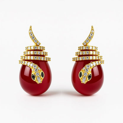 Palestro Milano Orecchini Gold perla rossa Serpentello con perla
