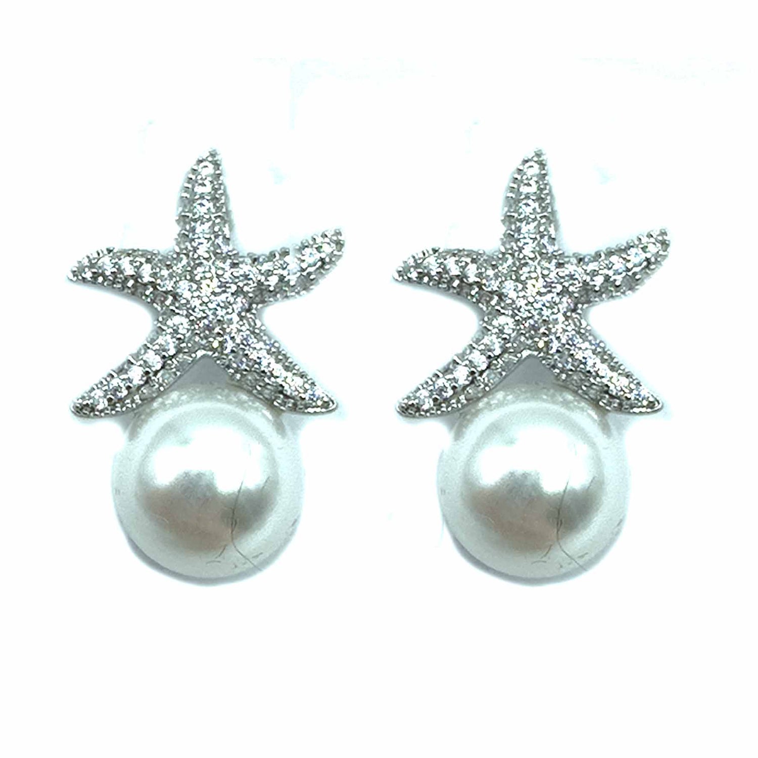 Palestro Milano Orecchini Perla con mini stella marina