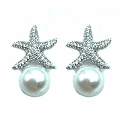 Palestro Milano Orecchini Perla con mini stella marina
