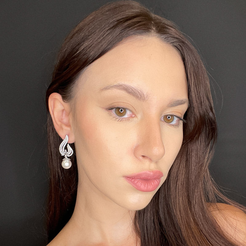 Palestro Milano Orecchini Virgola di pavè con perla