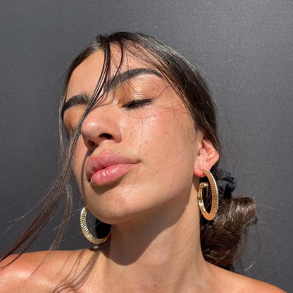 Palestro Milano Orecchini Rettilius